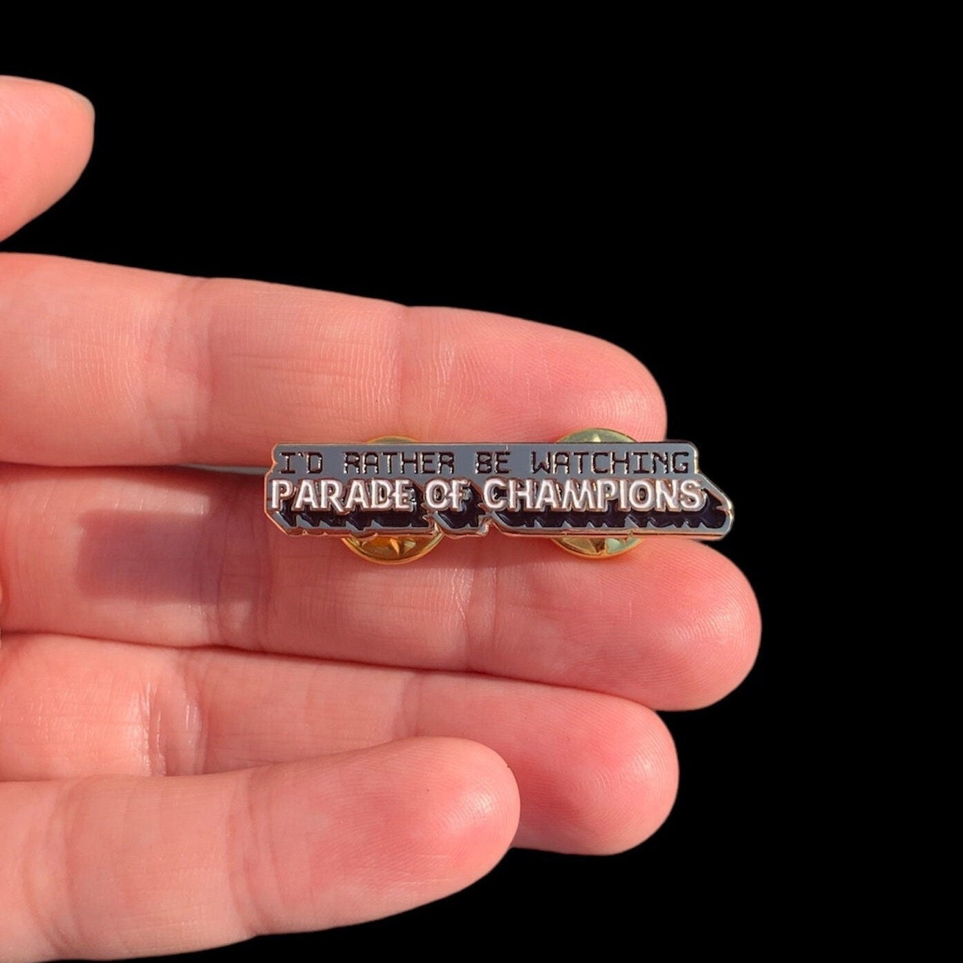 I'd Rather Be Watching Parade of Champions Enamel Pin